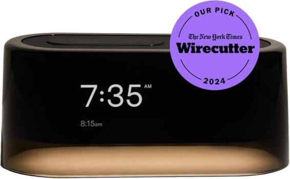 Loftie Smart Alarm Clock in black, featuring a digital display, Bluetooth speaker, sound machine, and nightlight functions.